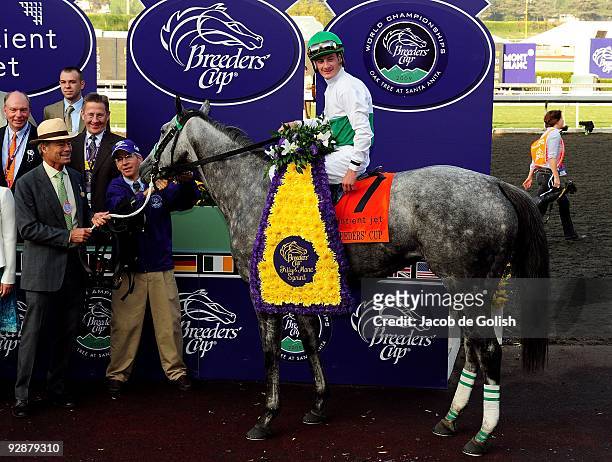 Jockey Julien Leparoux celebrates in the winner's circle with She Be Wild after winning the Breeders' Cup Juvenile Fillies race during the Breeders'...