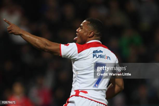 Kyle Eastmond of England celebrates scoring a try during the Gillette Four Nations match between England and New Zealand at Galpharm Stadium on...