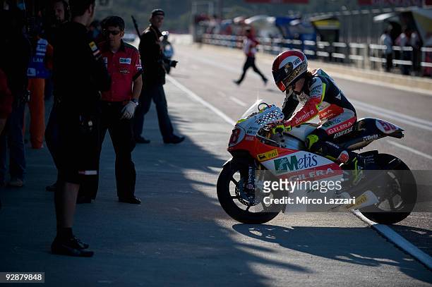 Marco Simoncelli of Italy and Metis Gilera returns to the pits during the qualifying practice session ahead of the MotoGP Of Valencia at the Valencia...