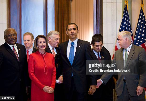 President Barack Obama stands with House Democratic leaders House Majority Whip James Clyburn , Rep. Joe Crowley , Speaker of the House Nancy Pelosi...