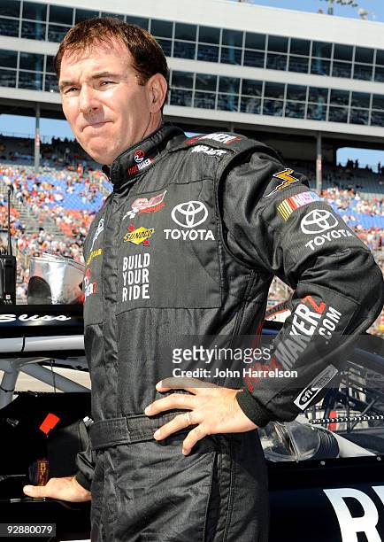 Mike Bliss, driver of the Ridemakerz Toyota, stands on pit road prior to the start of during the NASCAR Nationwide Series O'Reilly Challenge at Texas...