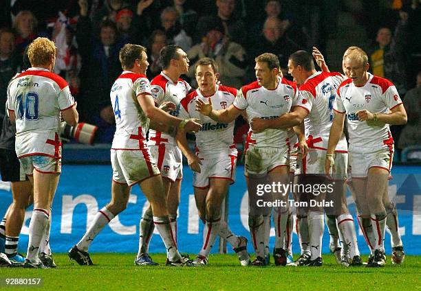 England players celebrate the second try by Peter Fox during the Gillette Four Nations match between England and New Zealand at The Galpharm Stadium...
