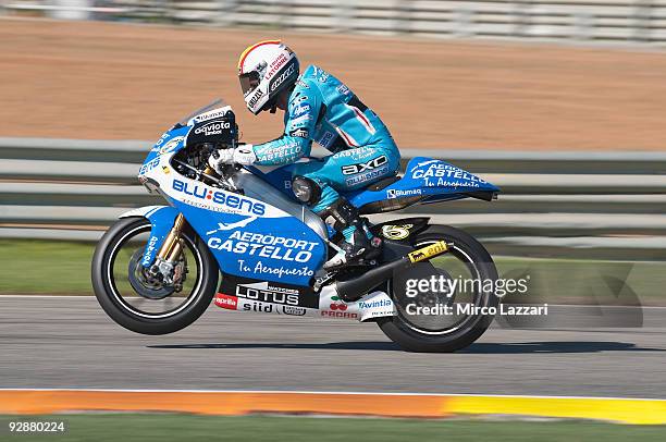 Alex Debon of Spain and Aeropuerto Castello Blusens heads down a straight during qualifying ahead of the MotoGP of Valencia at the Valencia Circuit...