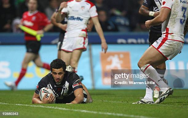 Ben Matulino of New Zealand scores a try during the Gillette Four Nations match between England and New Zealand at Galpharm Stadium on November 7,...
