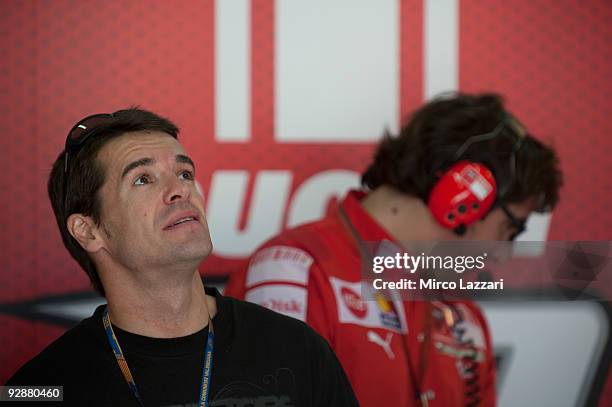 Carlos Checa of Spain looks on in box during the qualifying practice session during qualifying ahead of the MotoGP of Valencia at the Valencia...