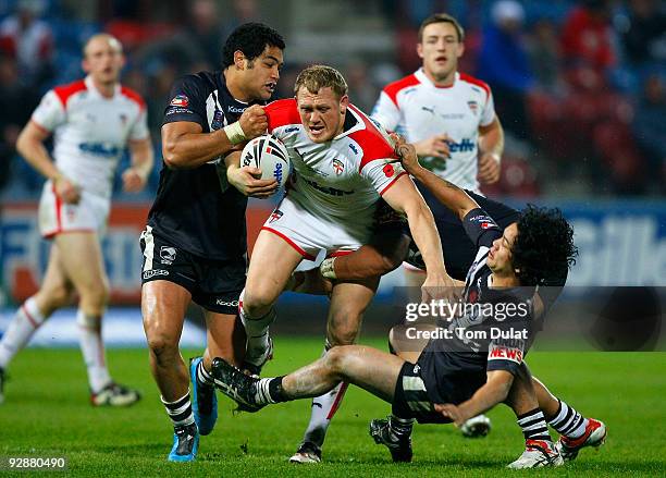 Ben Westwood of England runs through New Zeland defence during the Gillette Four Nations match between England and New Zealand at The Galpharm...