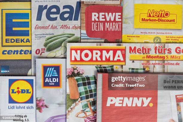 leaflets and flyers of german supermarket chains - edeka stock pictures, royalty-free photos & images
