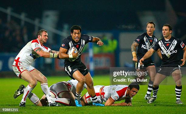 Kieran Foran of New Zeland is tackled during the Gillette Four Nations match between England and New Zealand at The Galpharm Stadium on November 07,...