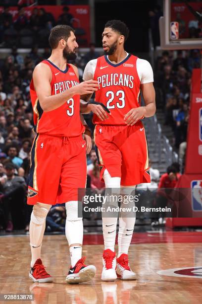 Anthony Davis of the New Orleans Pelicans and Omer Asik of the New Orleans Pelicans speak during the game against the LA Clippers on March 6, 2018 at...