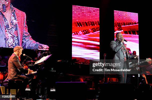 David Foster and Philip Baily perform as part of the David Foster & Friends Hit Man Tour 2009 at the HP Pavilion on November 6, 2009 in San Jose,...