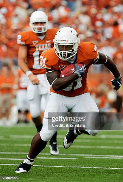 Running back Cody Johnson of the Texas Longhorns scores his second touchdown against the UCF Knights, a third down 13-yard run, on November 7, 2009...