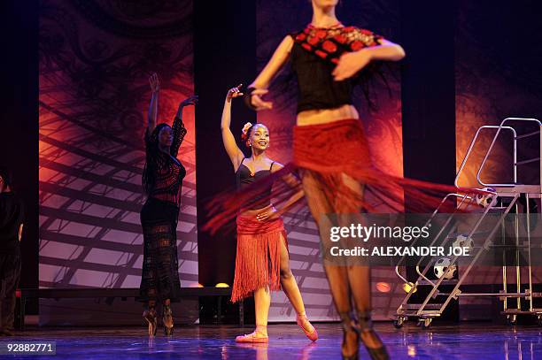 Members of a local ballet perform an adaptation of Carmen in Johannesburg on October 14, 2009. The production of Carmen set in Johannesburg, directed...