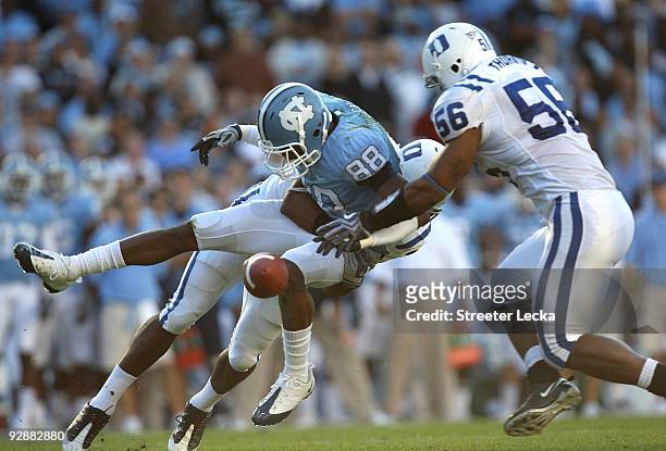 Damian Thornton of the Duke Blue Devils goes after a dropped ball by Erik Highsmith of the North Carolina Tar Heels during their game at Kenan...
