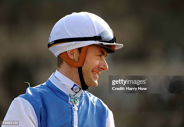 Jockey Olivier Peslier celebrates winning the TVG Breeders' Cup Mile race with Goldikova during the Breeders' Cup World Championships at Santa Anita...