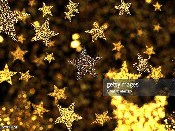 gold stars with some out of focus - gold star stock pictures, royalty-free photos & images
