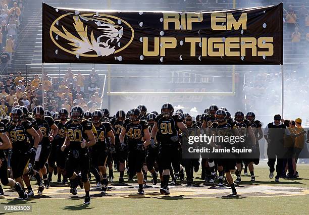 The Missouri Tigers run onto the field prior to the start of the game against the Baylor Bears at Faurot Field at Memorial Stadium on November 7,...