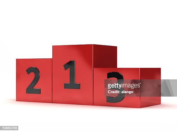 blocks of red podium with numbers written on them - winners podium stock pictures, royalty-free photos & images