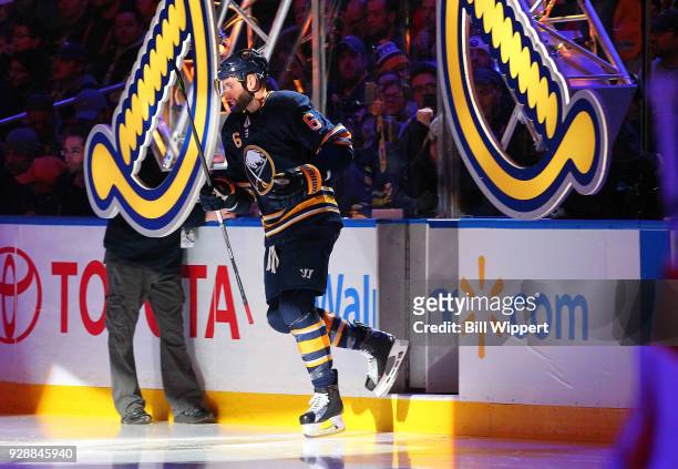 Marco Scandella of the Buffalo Sabres steps onto the ice before an NHL game against the Calgary Flames on March 7, 2018 at KeyBank Center in Buffalo,...