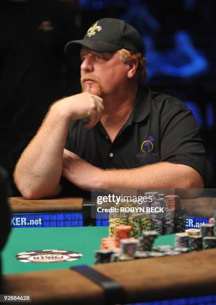 Player Darvin Moon, from Oakland, Maryland, waits for his cards at the final table at the 2009 World Series of Poker at the Penn & Teller Theater at...