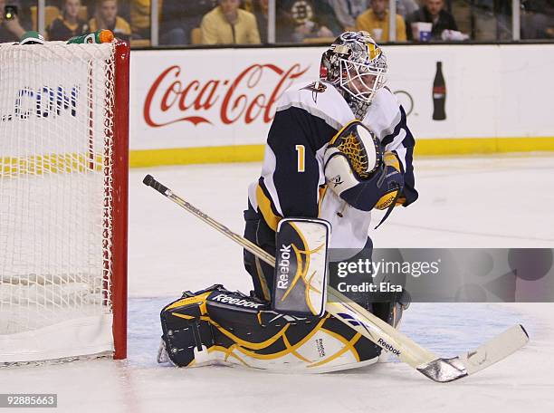 Jhonas Enroth of the Buffalo Sabres stops a shot by the Boston Bruins on November 7, 2009 at the TD Garden in Boston, Massachusetts.