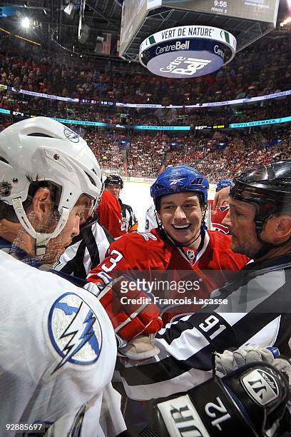 Ryan White of the Montreal Canadiens smiles at Ryan Malone of Tampa Bay Lightning during the NHL game on November 07, 2009 at the Bell Center in...