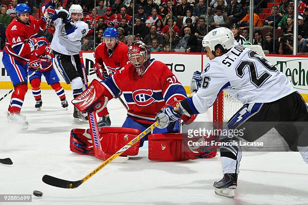 Martin St. Louis of Tampa Bay Lightning takes a shot on goalie Carey Price of the Montreal Canadiens during the NHL game on November 07, 2009 at the...