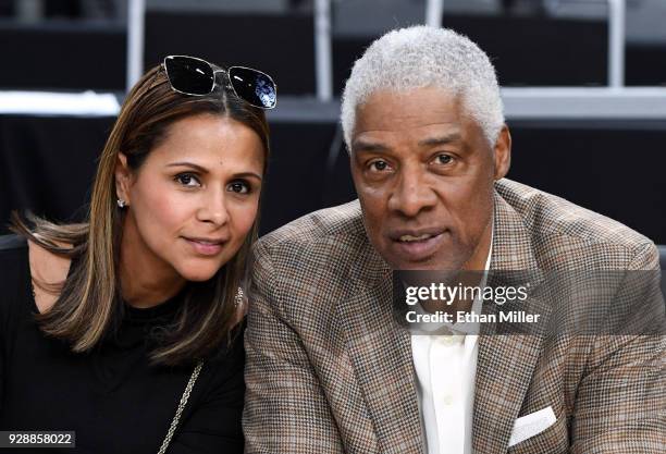 Dorys Erving and Basketball Hall of Fame member Julius "Dr. J" Erving attend a first-round game of the Pac-12 basketball tournament between the...