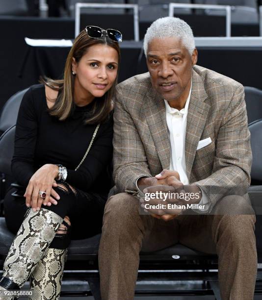 Dorys Erving and Basketball Hall of Fame member Julius "Dr. J" Erving attend a first-round game of the Pac-12 basketball tournament between the...