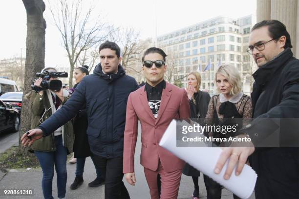 Actor Rami Malek and Lucy Boynton seen at the Miu Miu fashion show during Paris Fashion Week Womenswear Fall/Winter 2018/2019 on March 6, 2018 in...