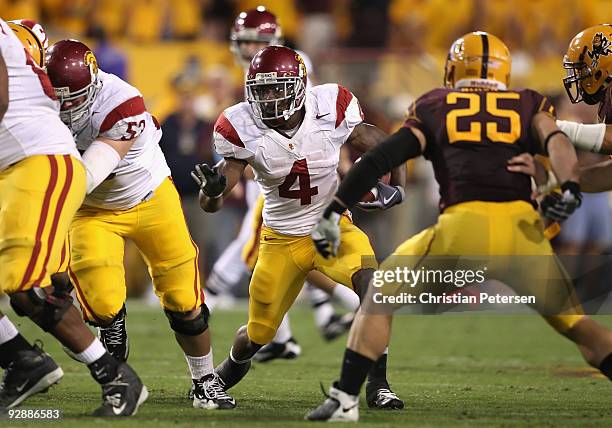 Runningback Joe McKnight of the USC Trojans rushes the football against the Arizona State Sun Devils during the college football game at Sun Devil...