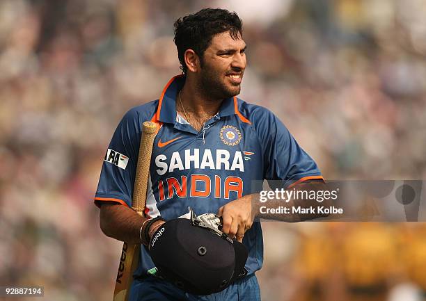 Yuvraj Singh of India leaves the field after being dismissed during the sixth One Day International match between India and Australia at Jawaharlal...