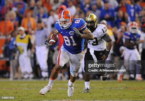 Tight end Aaron Hernandez of the Florida Gators grabs a pass and runs 64 yards against the Vanderbilt Commodores November 7, 2009 at Ben Hill Griffin...