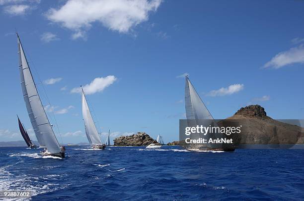 perfect caribbean vacation. sailing at st.barth - regatta stock pictures, royalty-free photos & images