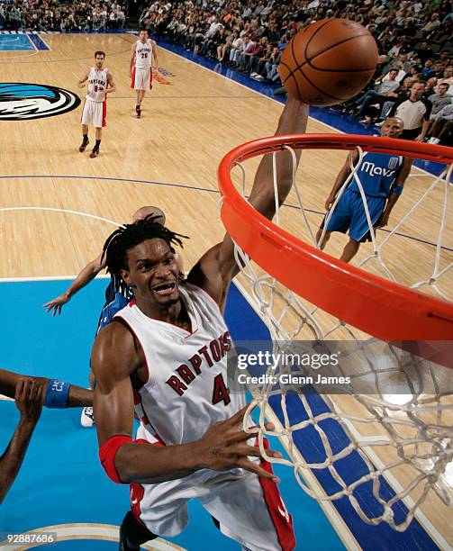 Chris Bosh of the Toronto Raptors goes up for the dunk against the Dallas Mavericks during a game at the American Airlines Center on November 7, 2009...