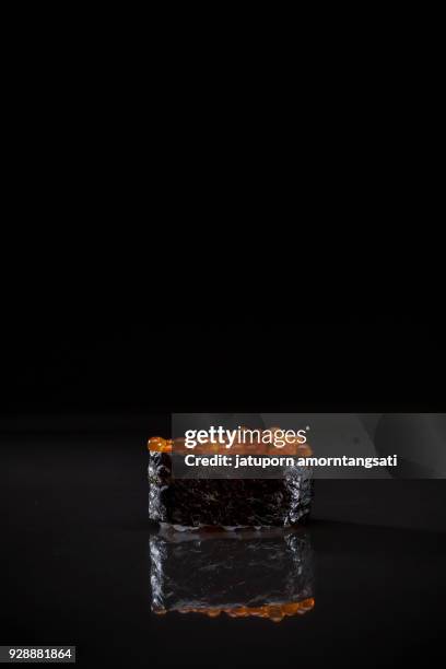 salmon eggs sushi nigiri - ikura stock pictures, royalty-free photos & images