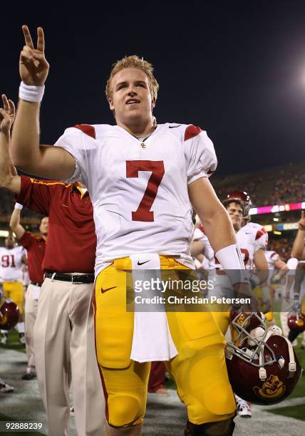 Quarterback Matt Barkley of the USC Trojans cheers with the band before the college football game against the Arizona State Sun Devils at Sun Devil...