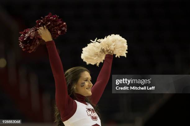 Massachusetts Minutemen cheerleaders performs during a timeout against the La Salle Explorers in the first round of the Atlantic 10 basketball...