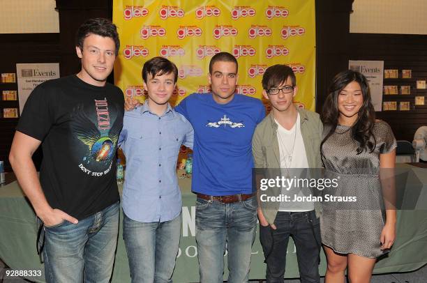 Actors Cory Monteith, Chris Colfer, Mark Salling, Kevin McHale and Jenna Ushkowitz and pose as the cast of "Glee" signs copies of "Glee: The Music...