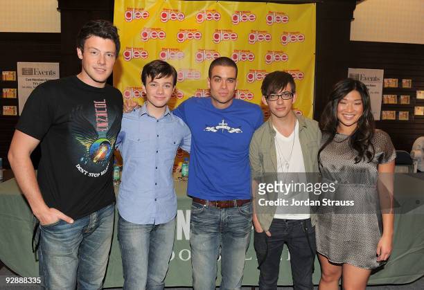 Actors Cory Monteith, Chris Colfer, Mark Salling, Kevin McHale and Jenna Ushkowitz and pose as the cast of "Glee" signs copies of "Glee: The Music...