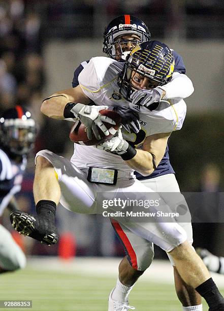 Conrad Meadows of the Northern Arizona Lumberjacks hauls in a pass against the Ole Miss Rebels at Vaught-Hemingway Stadium on November 7, 2009 in...