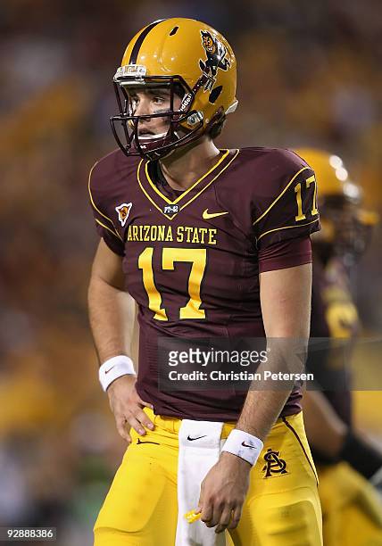 Quarterback Brock Osweiler of the Arizona State Sun Devils walks off the field after a turnover against the USC Trojans during the college football...