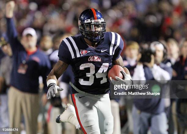 Brandon Bolden of the Ole Miss Rebels runs for a touchdown against the Northern Arizona Lumberjacks at Vaught-Hemingway Stadium on November 7, 2009...