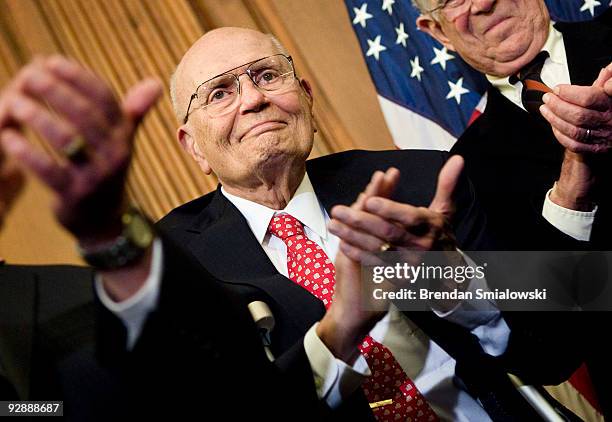 Rep. John Dingell claps during a press conference after a vote on healthcare on Capitol Hill November 7, 2009 in Washington, DC. The House of...