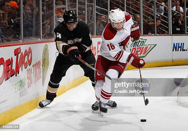Petr Prucha of the Phoenix Coyotes and Joffrey Lupul of the Anaheim Ducks battle for the puck in the third period at the Honda Center on November 7,...