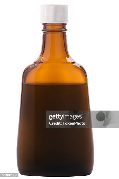 dark brown bottle with cap - vanilla stock pictures, royalty-free photos & images