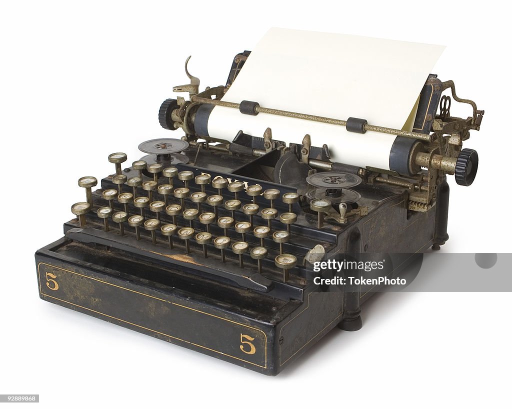 A old antique typewriter with blank paper