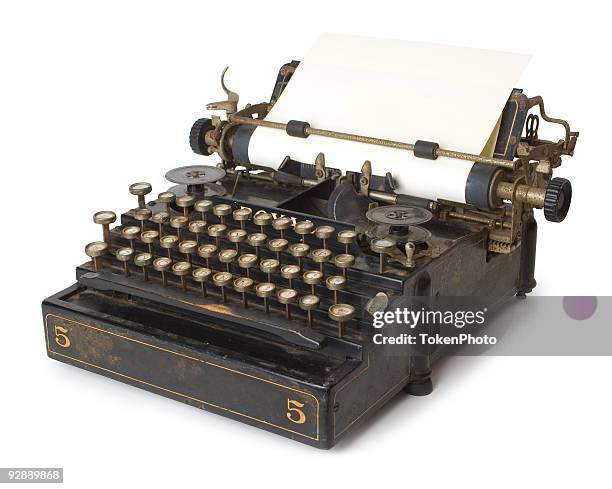 a old antique typewriter with blank paper - old typewriter stock pictures, royalty-free photos & images