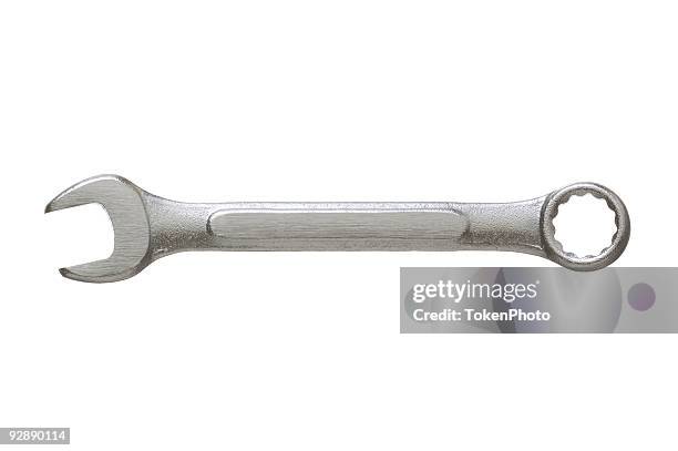 close-up of wrench isolated on white background - open end spanner stock pictures, royalty-free photos & images