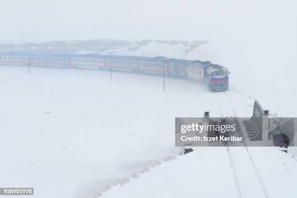 heavy snow fall, and eastern express train, near kars, eastern turkey - kars stock pictures, royalty-free photos & images
