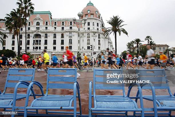 Some 10,000 runners take the start of the second edition of the Nice-Cannes marathon, a 42.195 km run along the French Riviera on November 8, 2009 on...